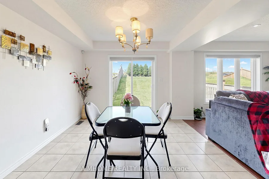 Dining area overlooking the extra-deep backyard